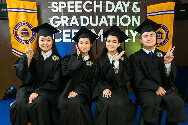 Harvest Academy graduates in caps and gowns celebrating at Speech Day and Graduation